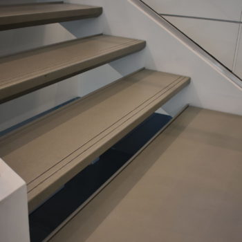 Appian, McLean Virginia. The Appian headquarters features 130 treads and seven landings
produced with Dexterity High Performance Concrete (HPC). The treads and landings are
custom-colored and polished to match the existing flooring. Each is formed with a recess to hide
the 3/8” steel structural pan, which the treads are installed upon.
